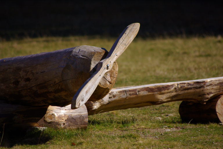 Close up wooden airplane at Merlet Park